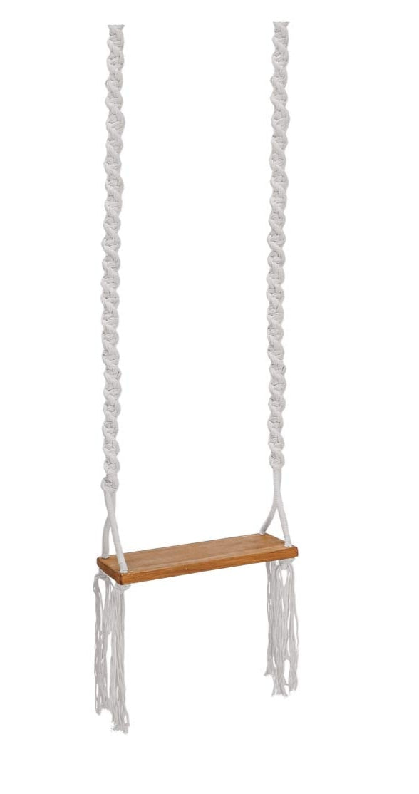 Wooden swing with white ropes on a white background