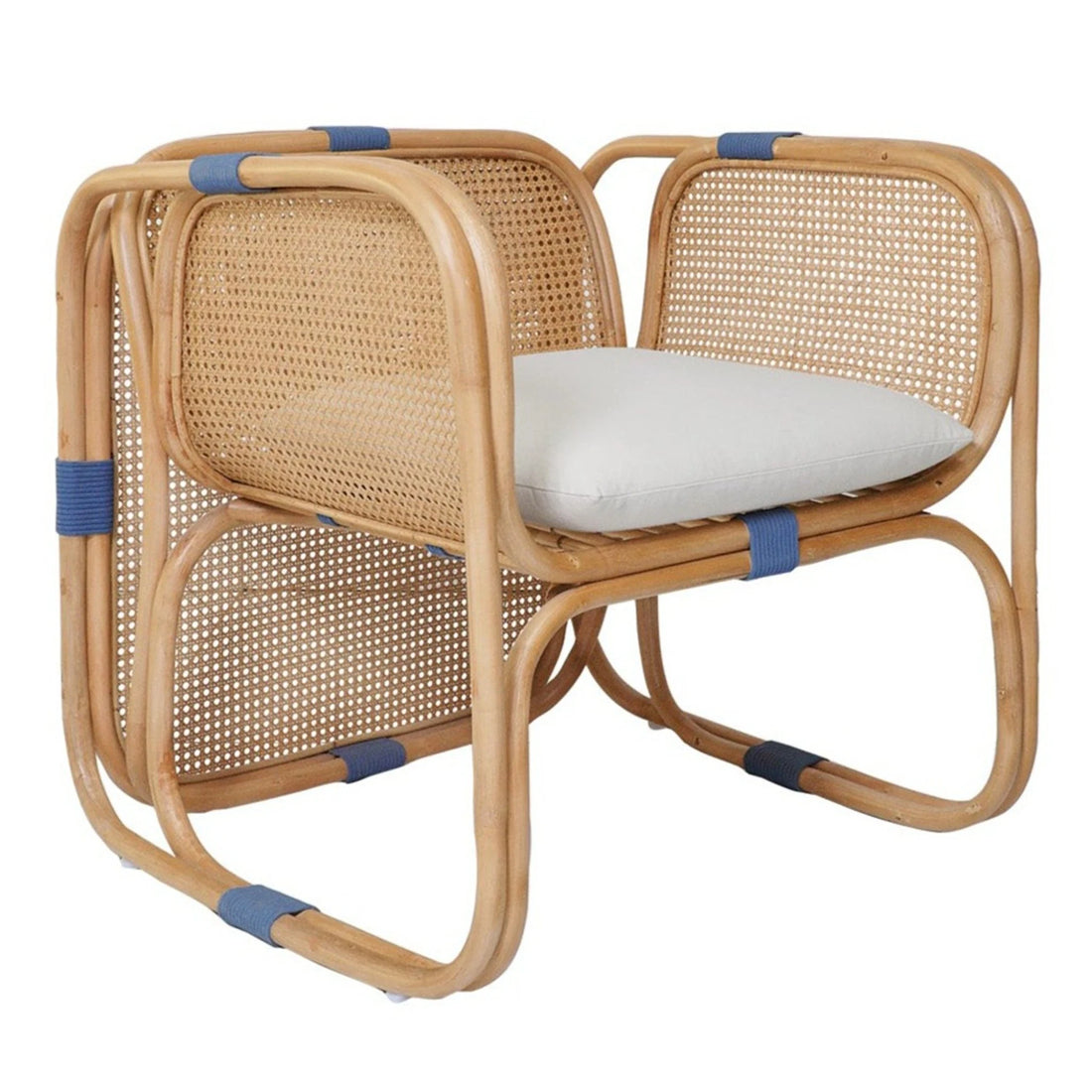 Armchair Capriccio rear angled studio view in natural rattan with blue accent bindings and white seat cushion