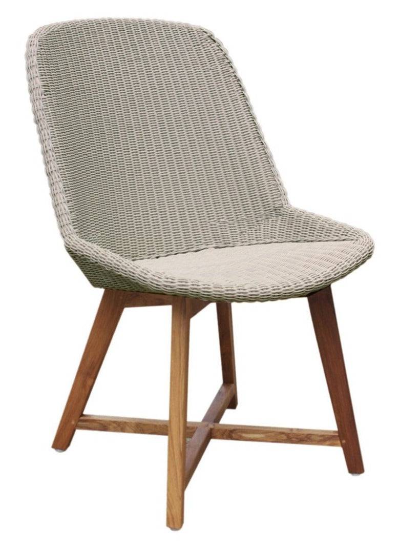 Woven dining chair from the Gipsy Collection with wooden legs, designed for hospitality and commercial use.