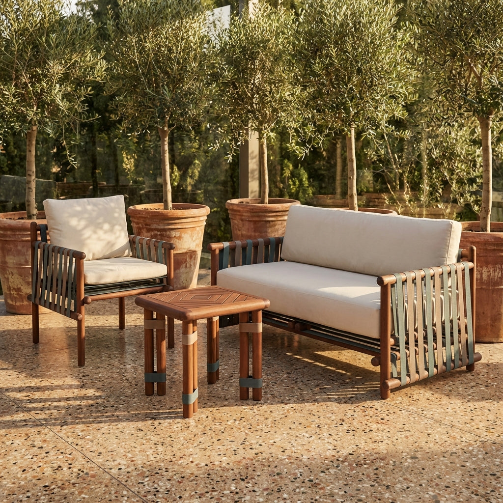 Lignes Collection outdoor seating set with wooden sofa, armchair, and side table in a garden setting