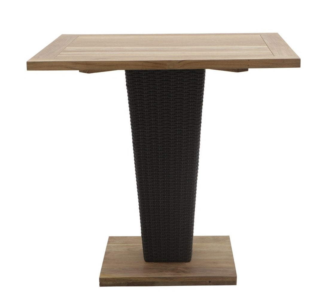 A square dining table with a teakwood tabletop and a single square leg, with a round teakwood tabletop supported by a single square leg in a clean, understated design.