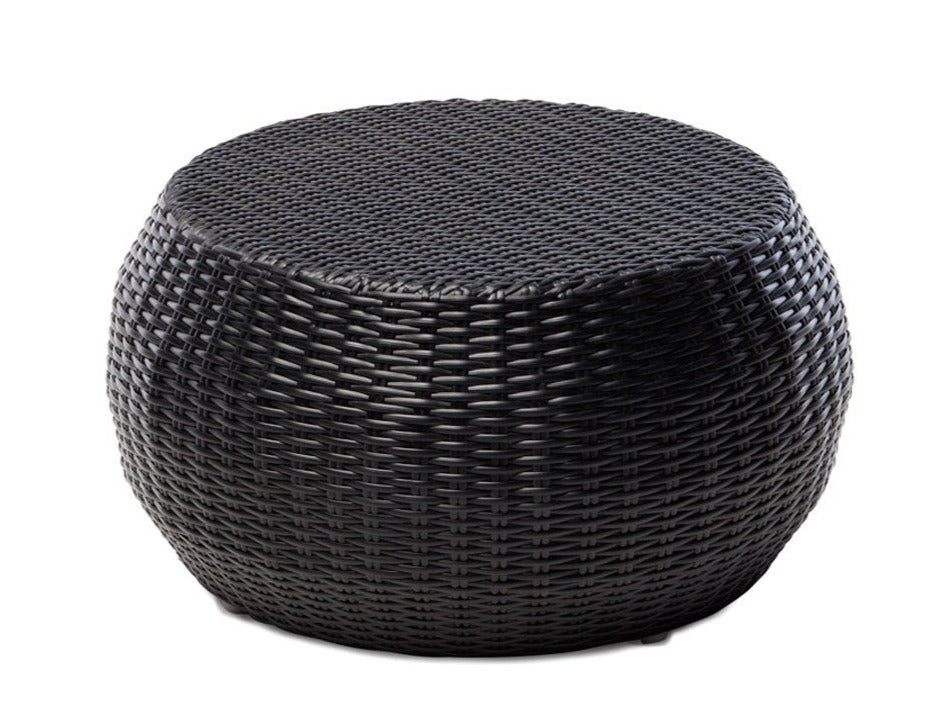 A round, outdoor side table or stool with a woven black finish, designed for versatility and functionality.