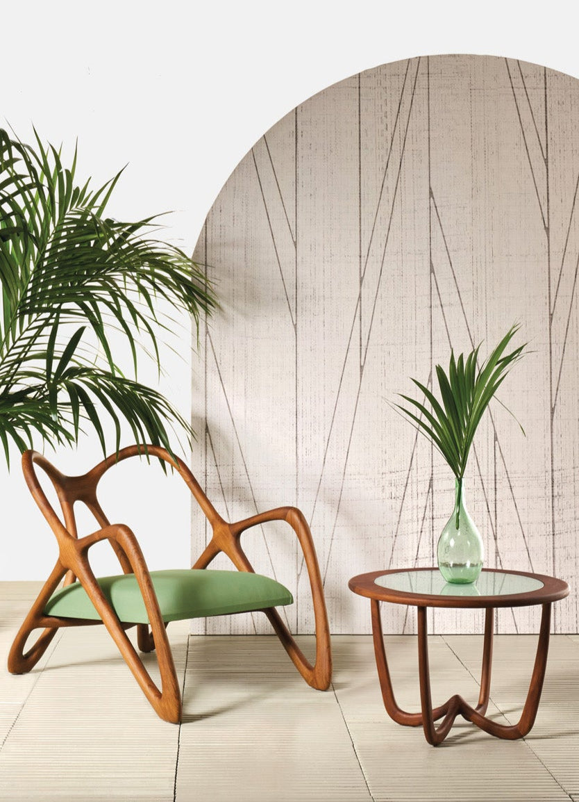Wooden chair with green cushion and matching side table 