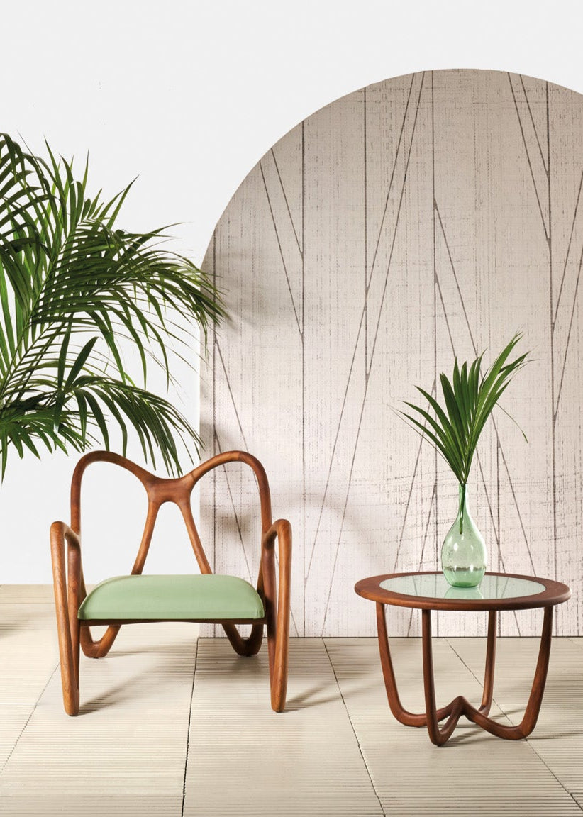 Wooden chair with green cushion and matching side table 