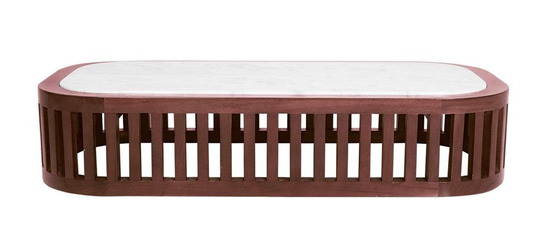 Rectangular coffee table with a white top and brown wooden frame 