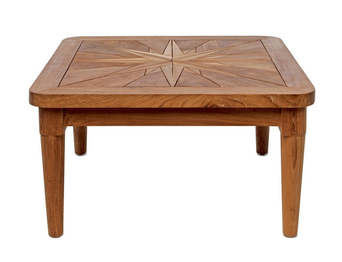 A wooden square side table with a geometric pattern on the tabletop.